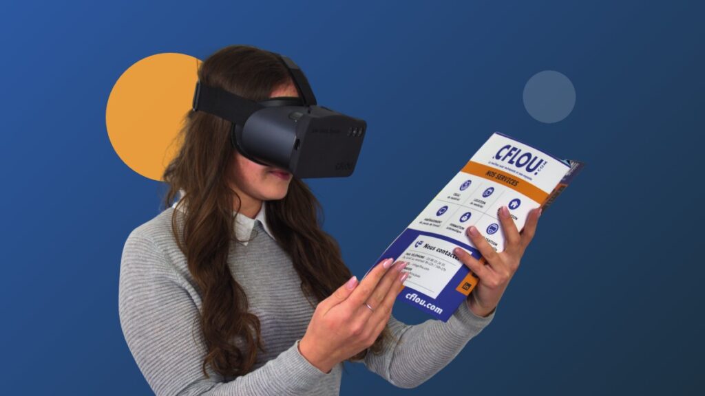 Une personne porte le simulateur de déficience visuelle en réalité augmentée CFLOU et lit une plaquette